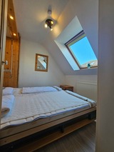 Appartement in Scharbeutz - Pinamar - Schlafzimmer mit Schrankbett untere Ebene