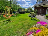 Ferienwohnung in Grube - Ostsee-Landhaus-Wohnung - Garten mit Spielplatz